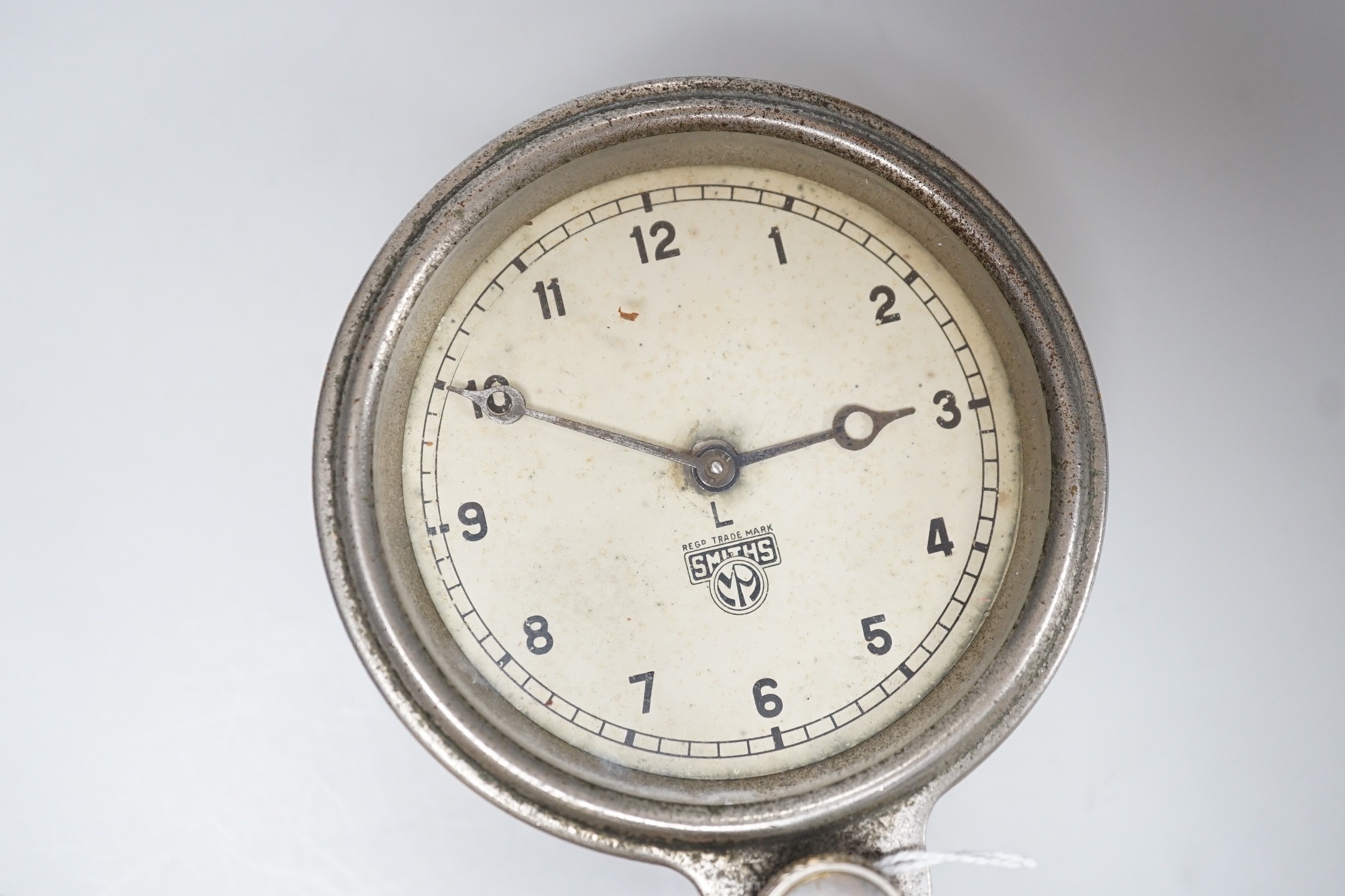 A Smiths MA 8day lever escapement front wind car clock with restoration paperwork, 9cm diam. overall